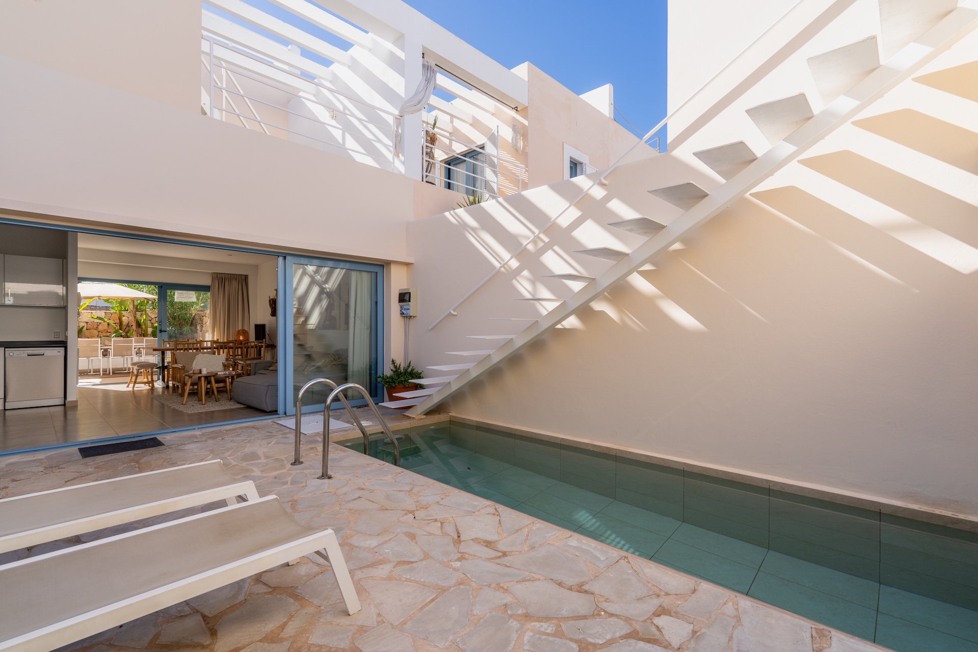 Resa Estates Ibiza sale ted koop Cala Tarida patio townhouse pool area.JPG